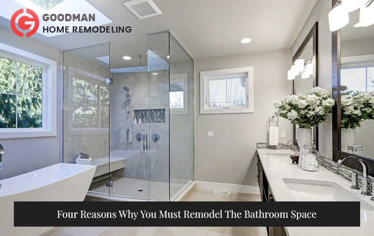 Luxury bathroom with a glass-enclosed shower, bathtub, and double vanity with large mirrors.